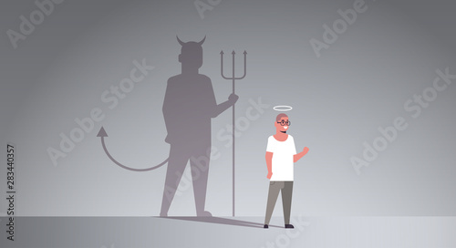 casual guy with nimbus choosing between good and evil shadow of devil imagination aspiration concept male cartoon character standing pose full length flat horizontal