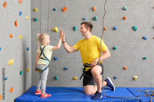 Little girl and instructor ...
