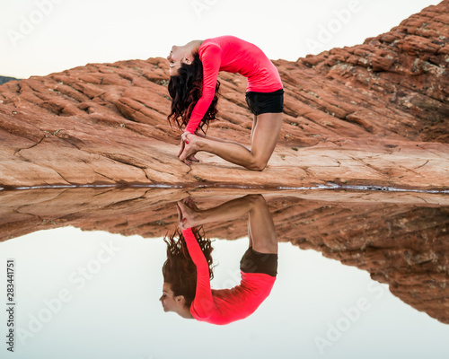 Yoga Pose Woman Next to Reflective Pool