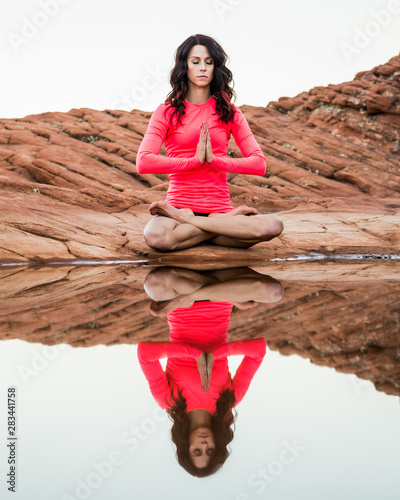 Meditation Yoga Pose Over Reflective Pool