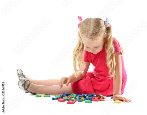 Cute little girl with lette...