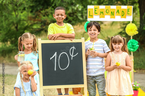 Cute little children sellin...