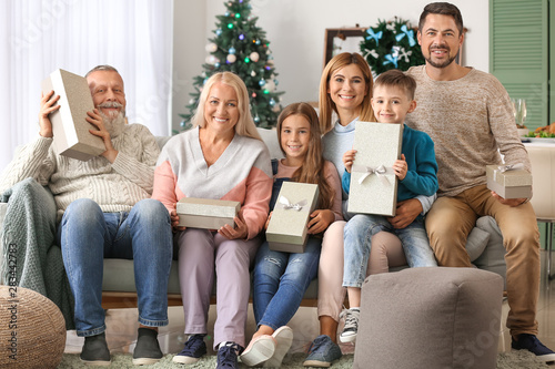 Happy family with gift boxe...
