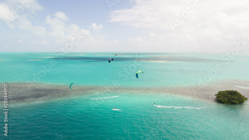 Aerial view kitesurf sport in caribbean sea Los Roques venezuela . Drone landscape