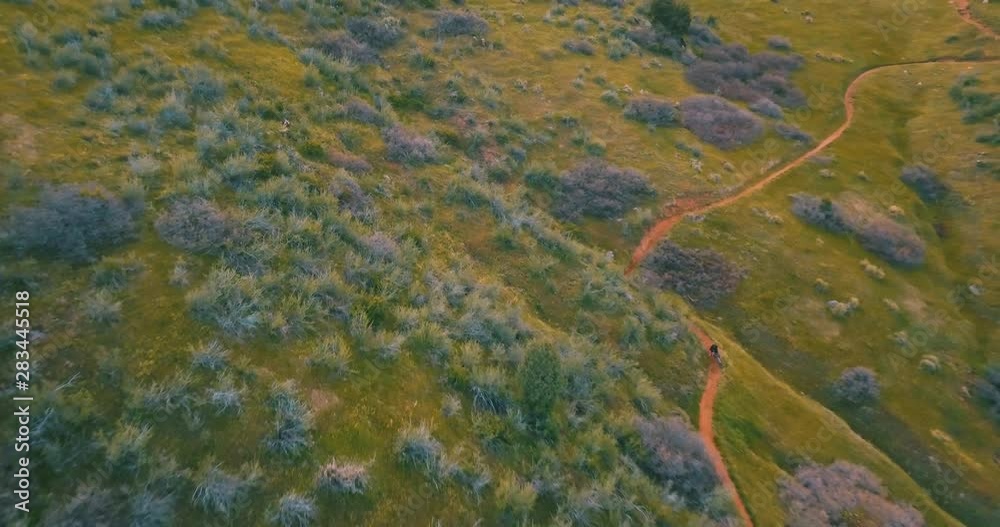 An amazing mountain biker descends a famous trail in Colorado. An amazing mountain biker descends a famous trail in Colorado.