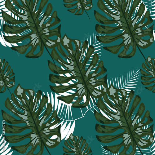 Fototapeta Naklejka Na Ścianę i Meble -  Tropical leaf design featuring navy Palm and blue Monstera plant leaves on a pink background. Seamless pattern.