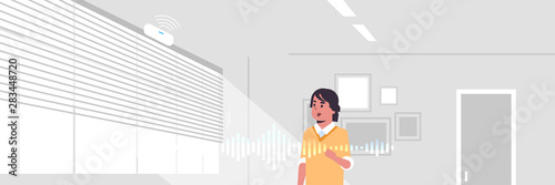 businessman using smart speaker voice recognition activated digital assistant concept modern office interior flat horizontal portrait