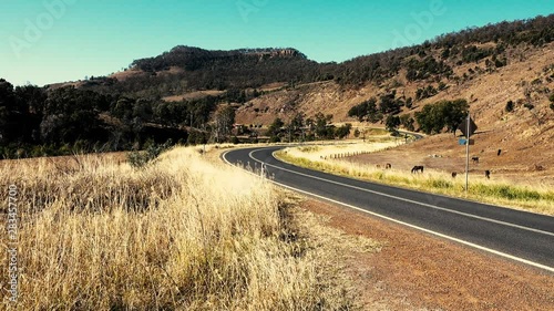 Windy rough road out in the countryside of Gatton, Queensland. photo