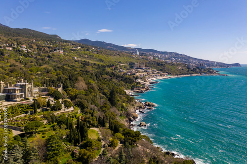 Fototapeta Naklejka Na Ścianę i Meble -  Panoramic aerial view of the Vorontsov Palace or the Alupka Palace on the Black Sea, Yalta, Crimea
