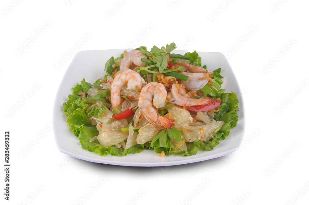 dressed spicy salad with prawn, pork, green herbs and nuts : delicious food on white background