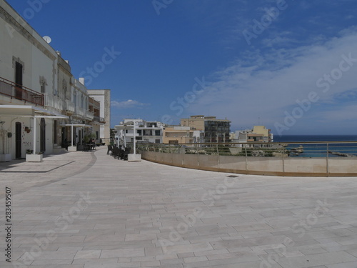 Otranto panorama of the beach and of the southern promenade. Otranto sandy beach and its white southern promenade are located on the Adriatic coast of Salento  Italy.