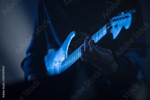Photography Guitarist playing live music