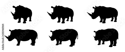 Set of rhino silhouettes from different angles. Vector illustration.