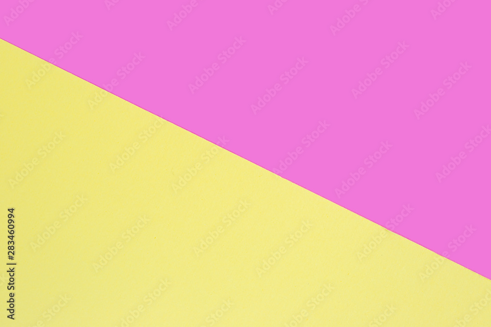Sheets of pink and yellow paper. Plain without pattern.