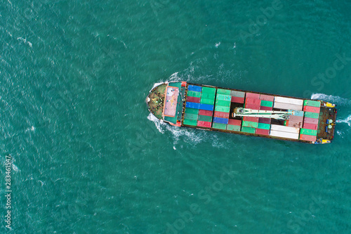 Aerial view container ship to sea port loading container for import export or transportation. shipping  business logistic. Trade Port and Shipping cargo to harbor, International transportation.
