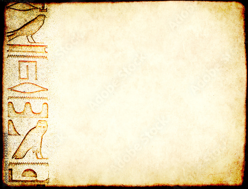 Grunge background with paper texture and detail of ancient egyptian hieroglyphs