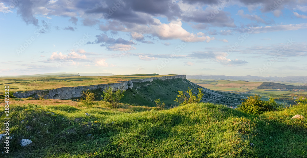 Panorama of the plateau with precipitous edges against sky
