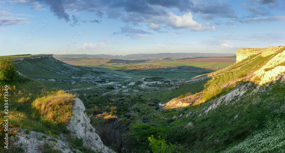 Panorama of the plateau with precipitous edges and valley