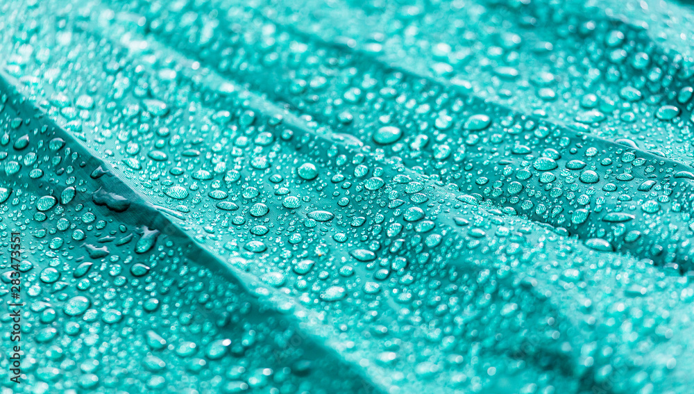 Obraz premium Raindrops on a tent as an abstract background