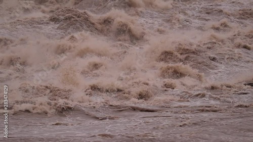 Rising Heavy flood water in submerged everything at Basava Sagar reservoir in North Karnataka, India. photo