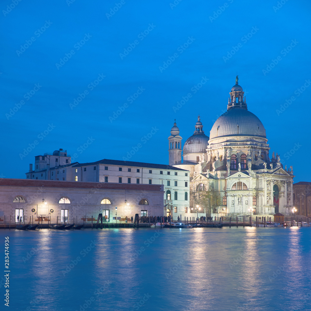  Illuminated church Santa Maria della Salute in Venice, Italy at night, copy-space