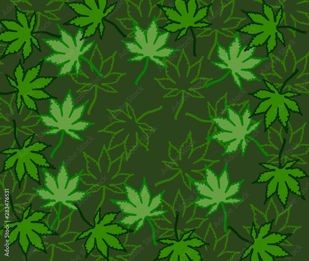 Green leaves and an unusual color on green tone background