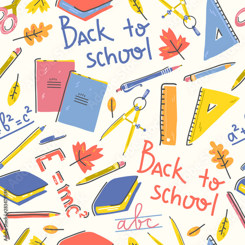 Seamless pattern with school stationery and lettering back to school.