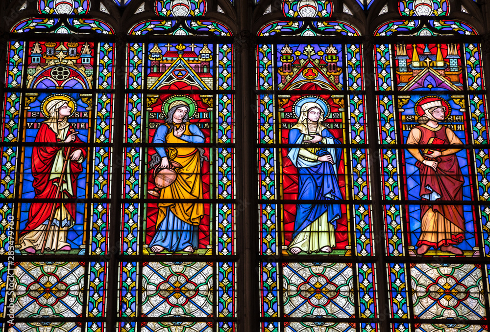  Colorful stained glass windows in  Basilique Saint-Urbain, 13th century gothic church in Troyes, France.