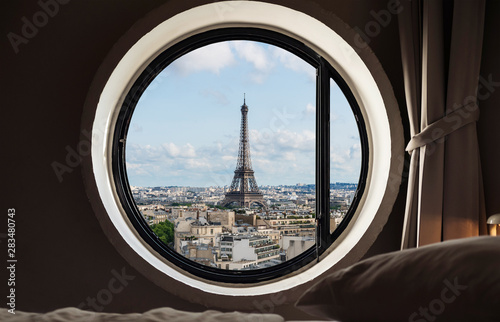 Canvas-taulu Looking through window, Eiffel tower famous landmark in Paris, France
