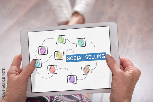 Fototapeta Naklejka Na Ścianę i Meble -  Social selling concept on a tablet