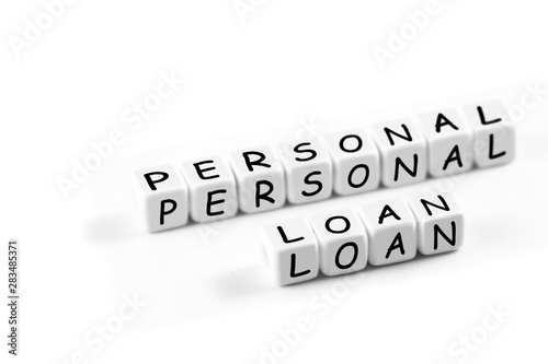 closeup finance concept in blocks with words Personal loan