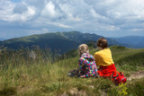 tourist girls relax in the mountains