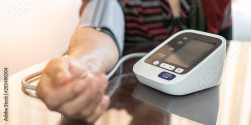 фотографія Elderly patient with bp, heart rate, digital pulse check equipment for medical g
