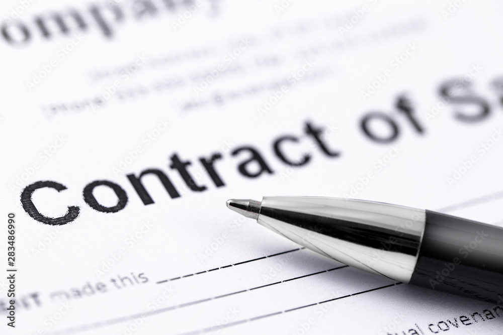 black pen and contract papers. Legal contract signing. black pen and contract papers. Legal contract signing.
