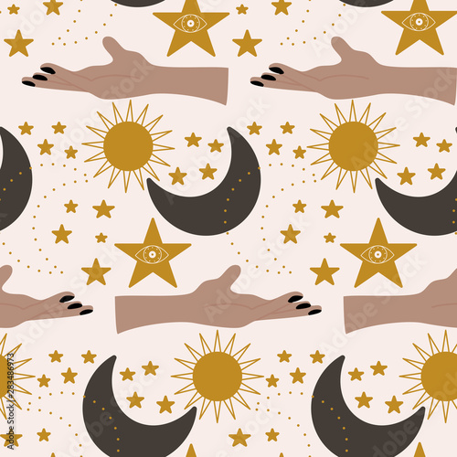 Hands and golden celestial elements in a seamless pattern design
