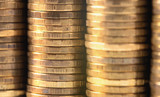 closeup macro stack of metal golden coins