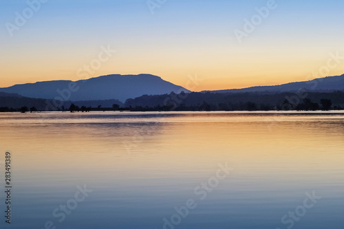 view morning of Mekong river around with the hills and orange sun light in the sky background, sunrise at Khong Chiam, Ubon Ratchathani, North-eastern of Thailand.