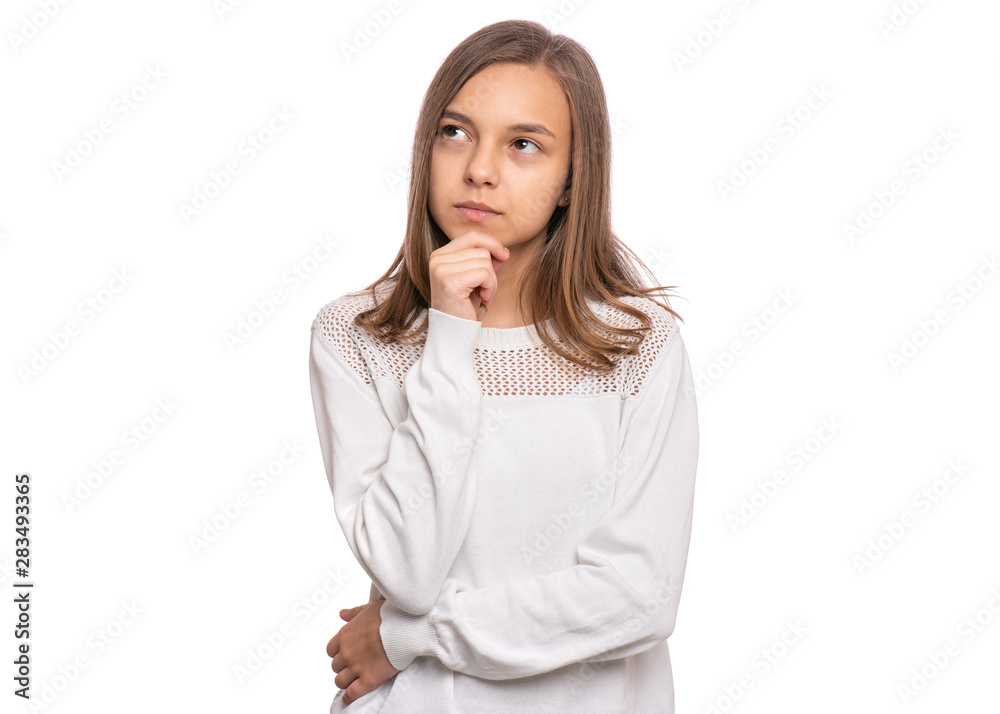 Portrait of pensive teen girl isolated on white background. Thoughtful teenager holding hand near the face, looking seriously away at copy space. Beautiful caucasian confident child student. Portrait of pensive teen girl isolated on white background. Thoughtful teenager holding hand near the face, looking seriously away at copy space. Beautiful caucasian confident child student.