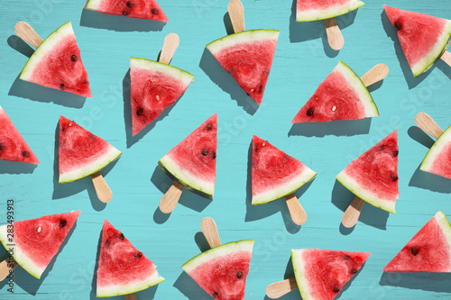 Watermelon pattern. Sliced watermelon on color background.