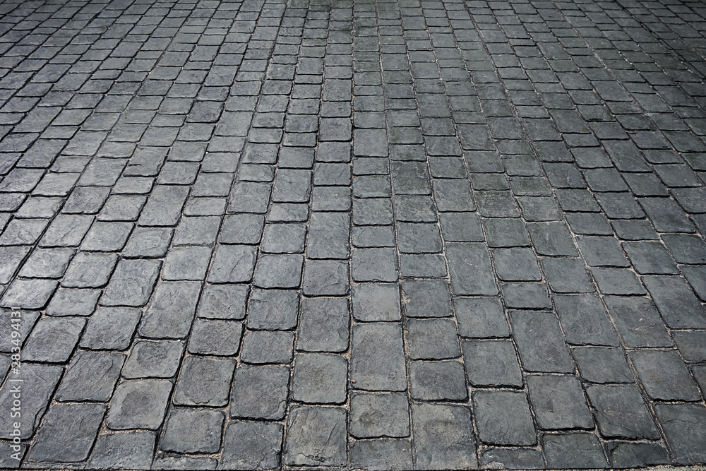 black stone tiles floor on road or walkway