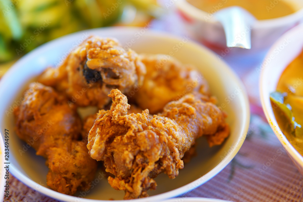 fried chicken with sauce on plate