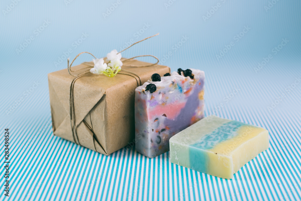 colorful handmade soaps on blue background colorful handmade soaps on blue background