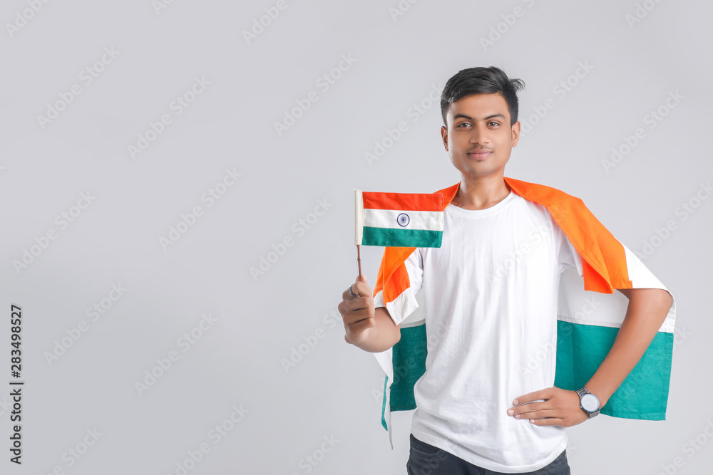 Young indian man with indian flag