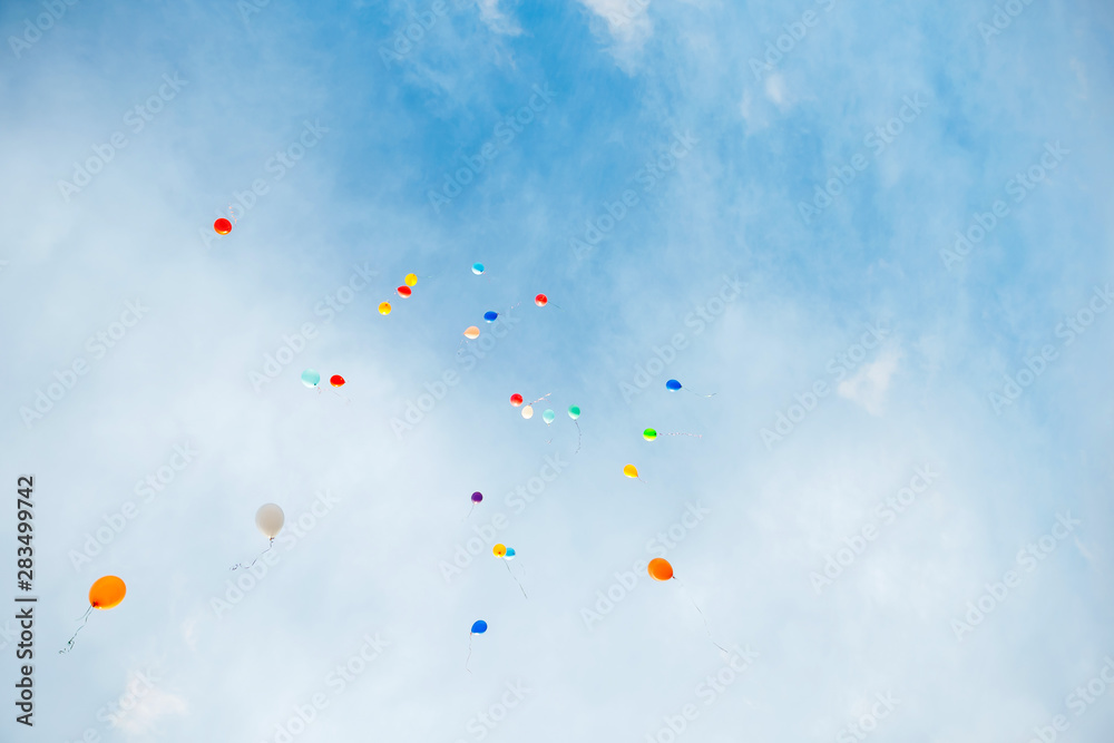 balloons flying in the sky among the clouds. Festive background balloons flying in the sky among the clouds. Festive background