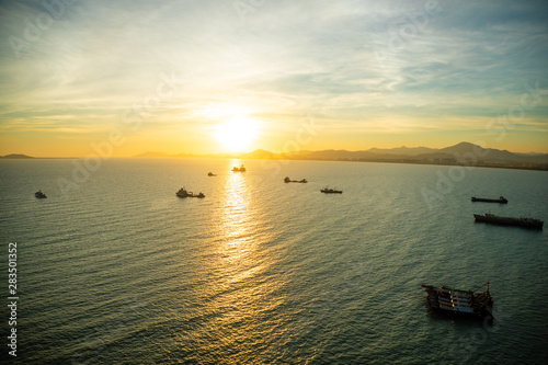 Fishing boats on sea in sunset lights in Sanya  Hainan  China