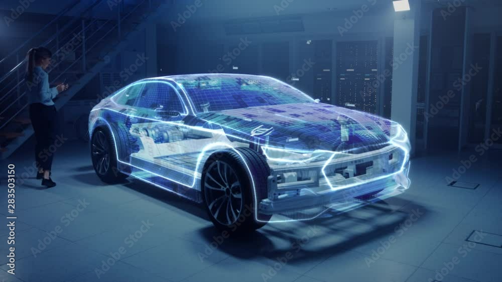 Female Automobile Engineer Using Tablet Computer Augmented Reality with 3D CAD Software. Innovative Facility: Vehicle Frame Developing into Wire Frame Vehicle Prototype