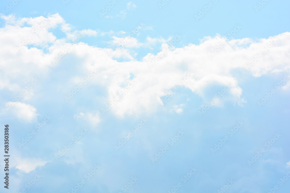 Bright and colorful photos of heavenly angelic white clouds and blue, blue sky with sunlight. Light, delicate and airy cloudy background with white and blue lights and colors. Bright and colorful photos of heavenly angelic white clouds and blue, blue sky with sunlight. Light, delicate and airy cloudy background with white and blue lights and colors.