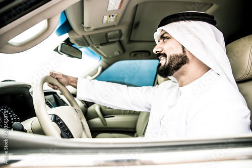 Photography Arabic man in his luxury car