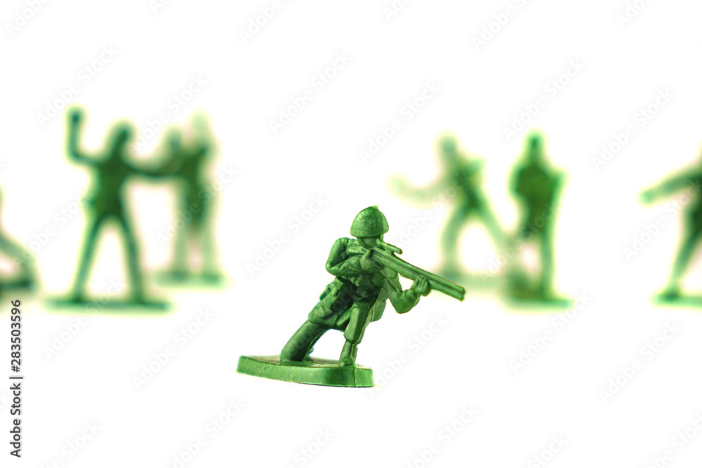 lot of plastic toy soldiers on white background. lot of plastic toy soldiers on white background.