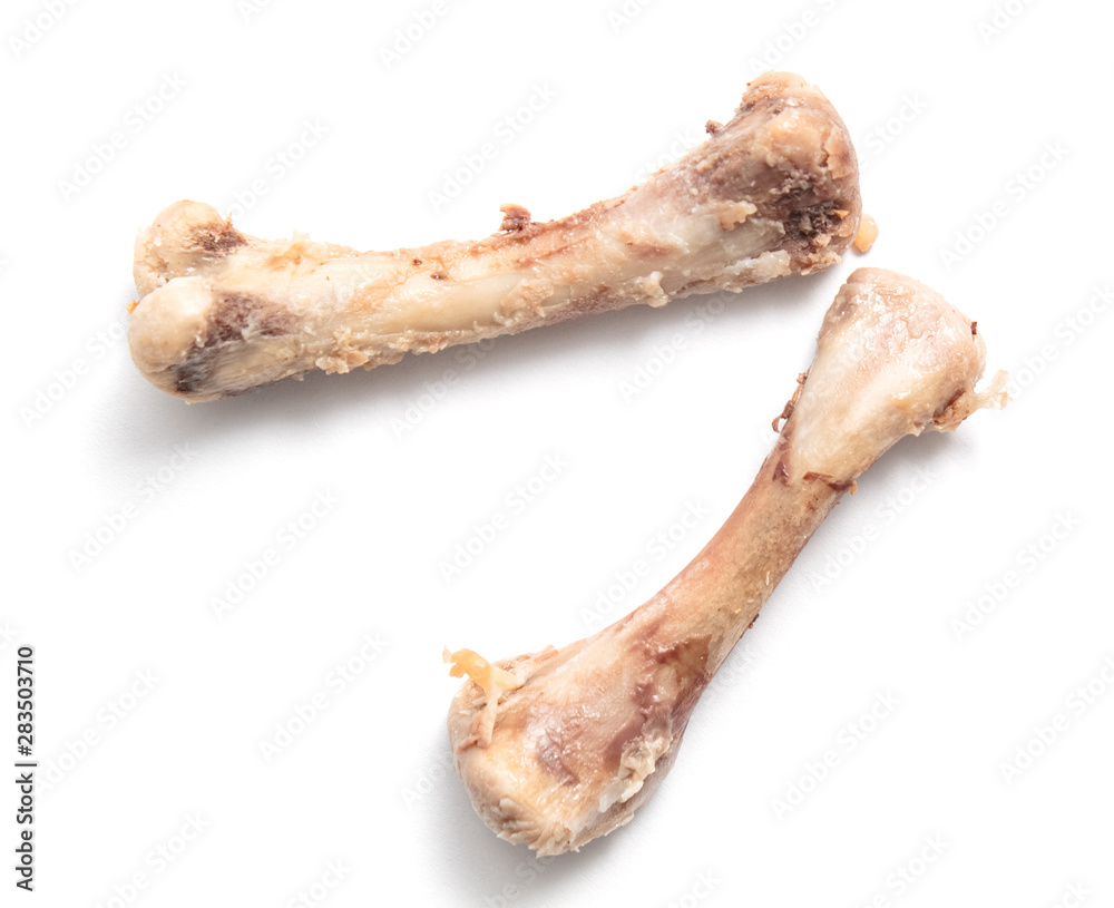 chicken bones on a white background, isolate. chicken bones on a white background, isolate.